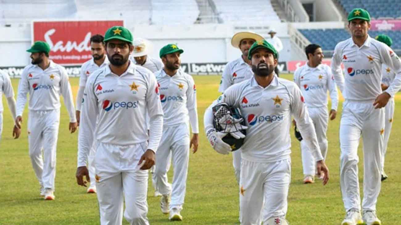Pakistani cricket team players are coming out of the ground after the match is over. Babar Azam and Mohammad Rizwan are prominent among them