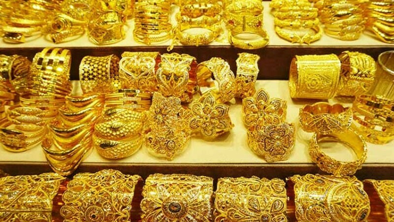 world gold market gold price decrease 13 dollar per tola